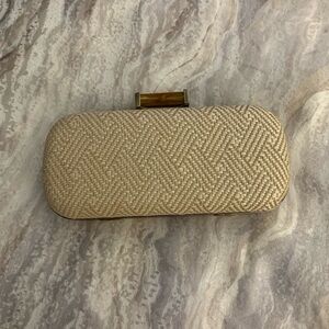 Straw finish baguette clutch.